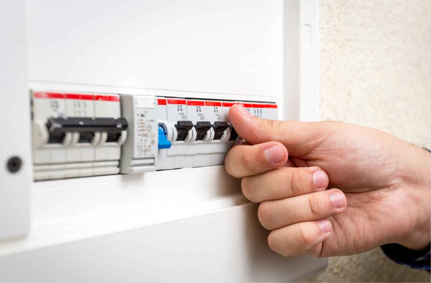Electrician working on a consumer unit